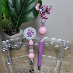 Matching pen and ID holder set